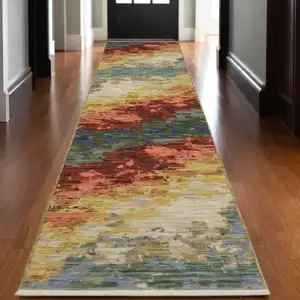 Photo of 12' Beige Salmon And Yellow Abstract Runner Rug With Fringe