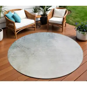 Photo of 8' Beige Sky Blue And Teal Blue Round Ombre Washable Indoor Outdoor Area Rug