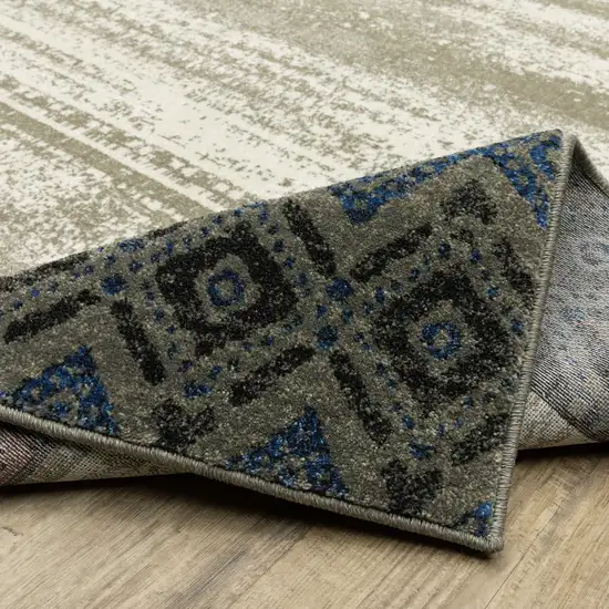 8' Beige Tan And Dark Blue Patchwork Runner Rug Photo 7