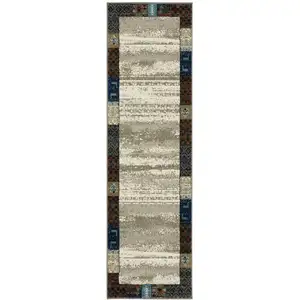 Photo of 8' Beige Tan And Dark Blue Patchwork Runner Rug