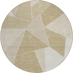 Photo of 8' Beige Tan And Ivory Round Geometric Washable Indoor Outdoor Area Rug