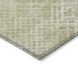 Photo of 8' Beige Tan And Ivory Round Geometric Washable Indoor Outdoor Area Rug