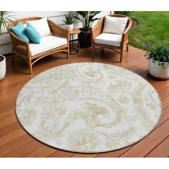 8' Beige Tan And Ivory Round Paisley Washable Indoor Outdoor Area Rug Photo 1