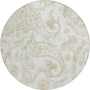 Photo of 8' Beige Tan And Ivory Round Paisley Washable Indoor Outdoor Area Rug