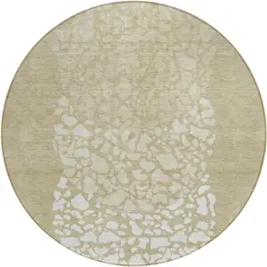 Photo of 8' Beige Tan And Taupe Round Abstract Washable Indoor Outdoor Area Rug