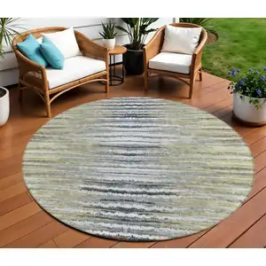 Photo of 8' Beige Tan And Taupe Round Striped Washable Indoor Outdoor Area Rug