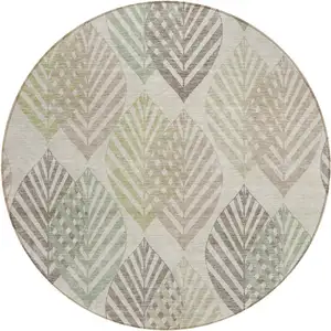 Photo of 8' Beige Taupe And Artichoke Green Round Floral Washable Indoor Outdoor Area Rug