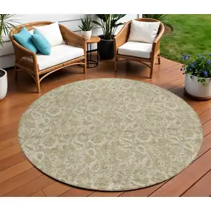 Photo of 8' Beige Taupe And Brown Round Floral Washable Indoor Outdoor Area Rug