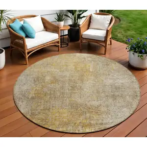 Photo of 8' Beige Taupe And Ivory Round Abstract Washable Indoor Outdoor Area Rug