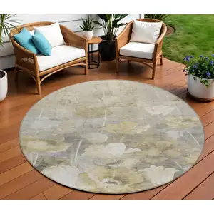 Photo of 8' Beige Taupe And Wheat Round Floral Washable Indoor Outdoor Area Rug