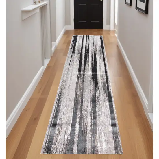 8' Beige and Black Abstract Power Loom Runner Rug Photo 1