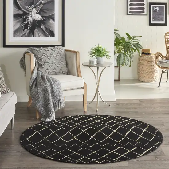 5' Beige and Black Round Abstract Power Loom Area Rug Photo 8