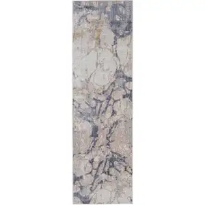 Photo of 12' Beige and Blue Abstract Power Loom Distressed Runner Rug