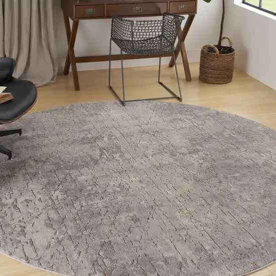 8' Beige and Gray Round Abstract Power Loom Area Rug Photo 7