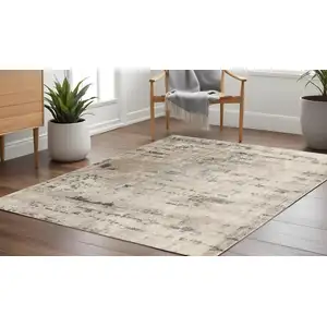 Photo of 10' Beige and Gray Square Abstract Power Loom Area Rug