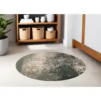 Photo of 5' Beige and Green Round Abstract Non Skid Area Rug