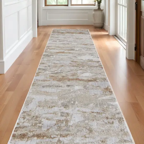 10' Beige and Ivory Abstract Power Loom Distressed Runner Rug Photo 1