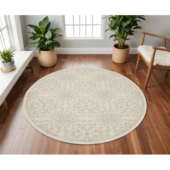 8' Beige and Ivory Floral Non Skid Round Rug Photo 1