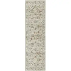 Photo of 8' Beige and Ivory Oriental Power Loom Distressed Runner Rug With Fringe