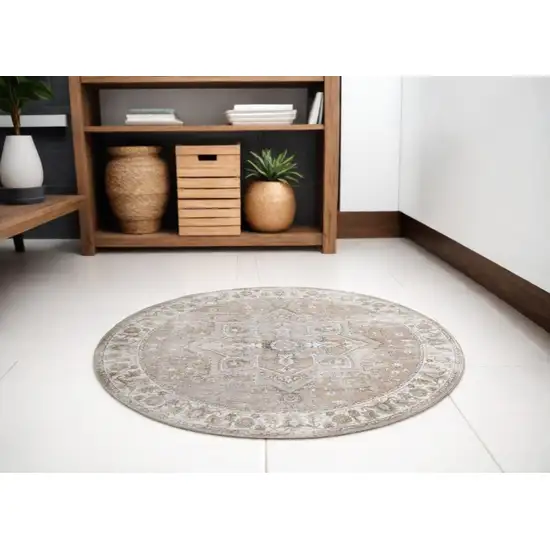 5' Beige and Ivory Round Floral Medallion Power Loom Washable Area Rug Photo 1