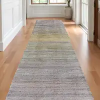 Photo of 10' Beige and Purple Ombre Hand Woven Runner Rug