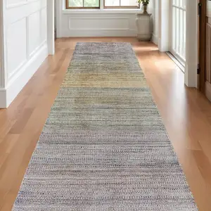 Photo of 10' Beige and Purple Ombre Hand Woven Runner Rug