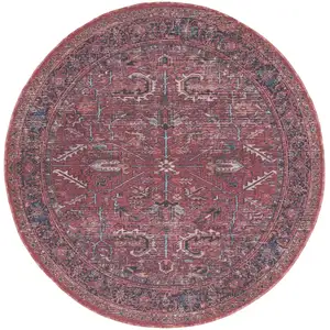 Photo of 8' Beige and Red Round Floral Power Loom Distressed Area Rug