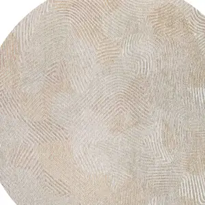 Photo of 5' Beige and White Round Abstract Non Skid Area Rug