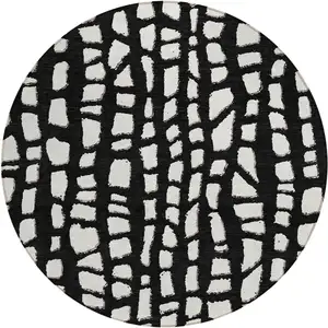 Photo of 8' Black And Ivory Round Abstract Washable Indoor Outdoor Area Rug