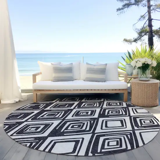 8' Black And Ivory Round Geometric Washable Indoor Outdoor Area Rug Photo 7