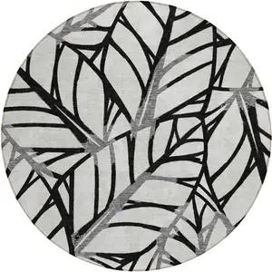 Photo of 8' Black Gray And Beige Round Floral Washable Indoor Outdoor Area Rug