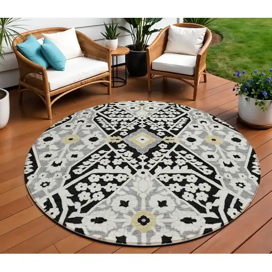 8' Black Gray And Gold Round Floral Washable Indoor Outdoor Area Rug Photo 1