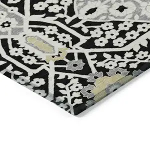 Photo of 8' Black Gray And Gold Round Floral Washable Indoor Outdoor Area Rug