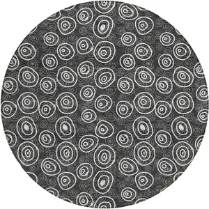 Photo of 8' Black Gray And Ivory Round Geometric Washable Indoor Outdoor Area Rug