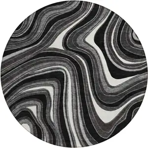 Photo of 8' Black Gray And White Round Abstract Washable Indoor Outdoor Area Rug