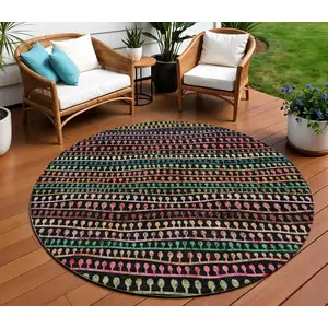 Photo of 8' Black Green And Gold Round Striped Washable Indoor Outdoor Area Rug