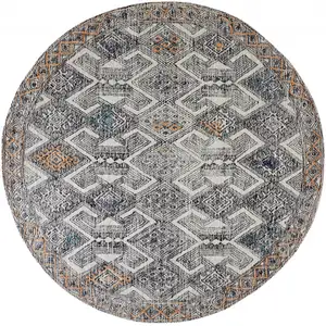 Photo of 8' Black Ivory And Green Round Wool Geometric Tufted Handmade Distressed Area Rug