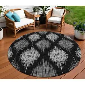 Photo of 8' Black Silver And Gray Round Ikat Washable Indoor Outdoor Area Rug