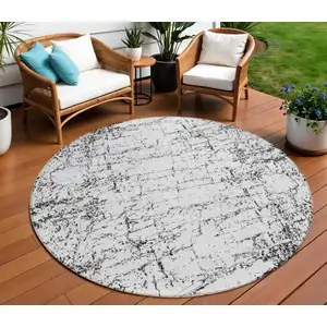 Photo of 8' Black White And Gray Round Abstract Washable Indoor Outdoor Area Rug