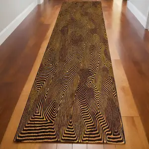 Photo of 10' Black and Gold Abstract Non Skid Area Rug