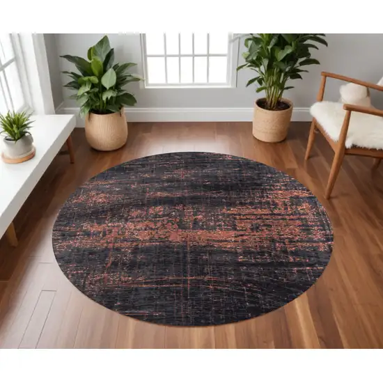 8' Black and Gold Round Abstract Non Skid Area Rug Photo 1