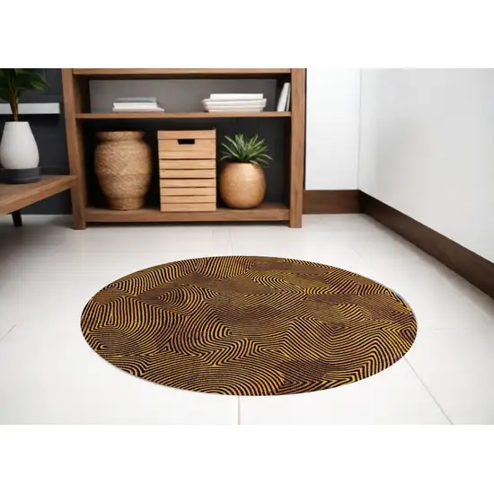 5' Black and Gold Round Abstract Non Skid Area Rug Photo 1