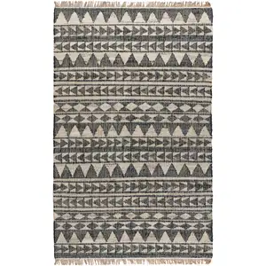 Photo of 8' Black and Ivory Geometric Hand Woven Runner Rug With Fringe