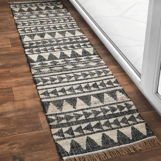 8' Black and Ivory Geometric Hand Woven Runner Rug With Fringe Photo 7