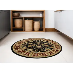 Photo of 6' Black and Red Round Floral Area Rug