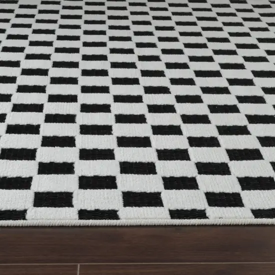 10' Black and White Geometric Distressed Indoor Outdoor Runner Rug Photo 5