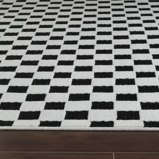 10' Black and White Geometric Distressed Indoor Outdoor Runner Rug Photo 4