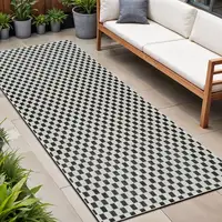 Photo of 8' Black and White Geometric Distressed Indoor Outdoor Runner Rug