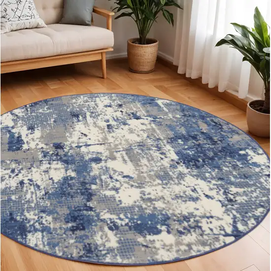 8' Blue Abstract Power Loom Round Rug Photo 1