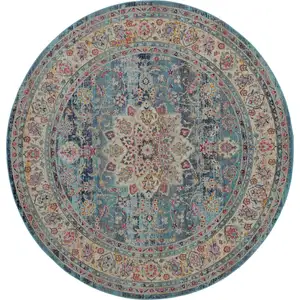 Photo of 4' Blue And Beige Floral Distressed Round Rug